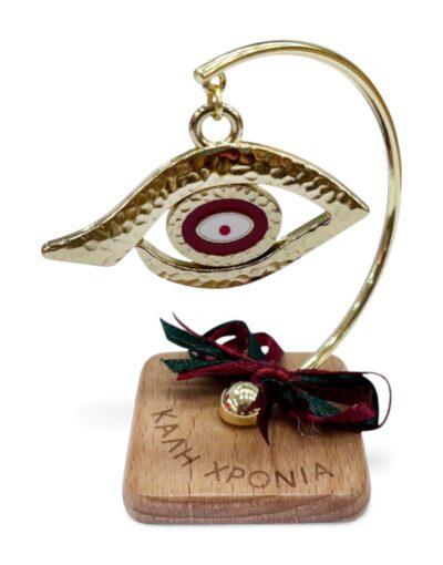γούρι καλή χρονιά μάτι κόκκινο χρυσό σε ξύλινη βάση charm 1